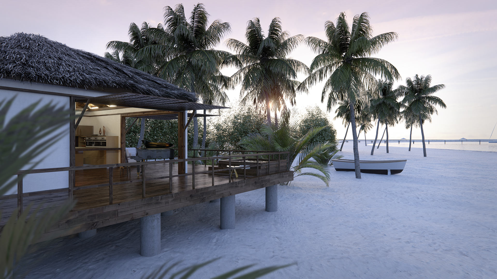 Vista de la cocina en un entorno rústico y veraniego en el que se observan palmeras y una barca en una playa