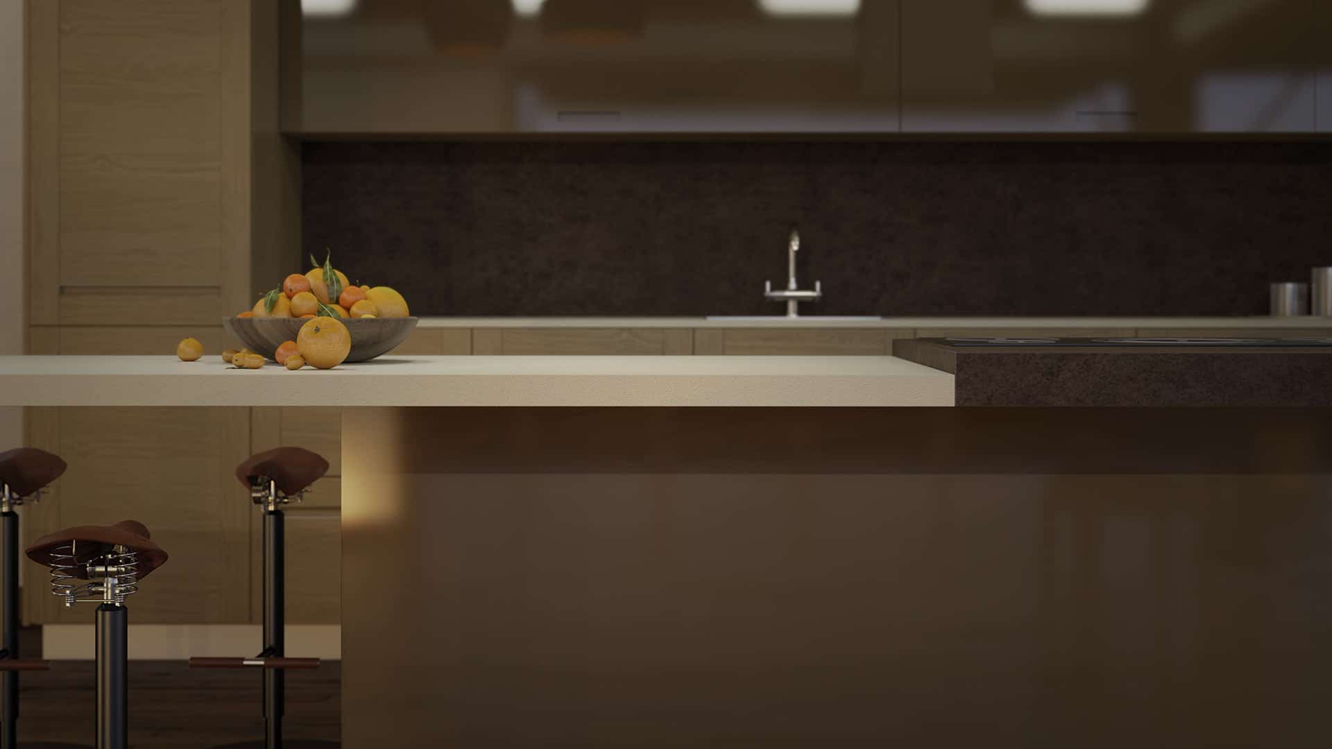 Muebles de diseño de cocina isla minimalista mitad en color blanco con un cuenco de frutas a modo de decoración y mitad con acabado en madera con vitrocerámica