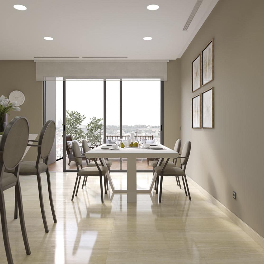 Elegante mesa de diseño minimalista en color blanco con platos sobre ella y rodeada de sillas