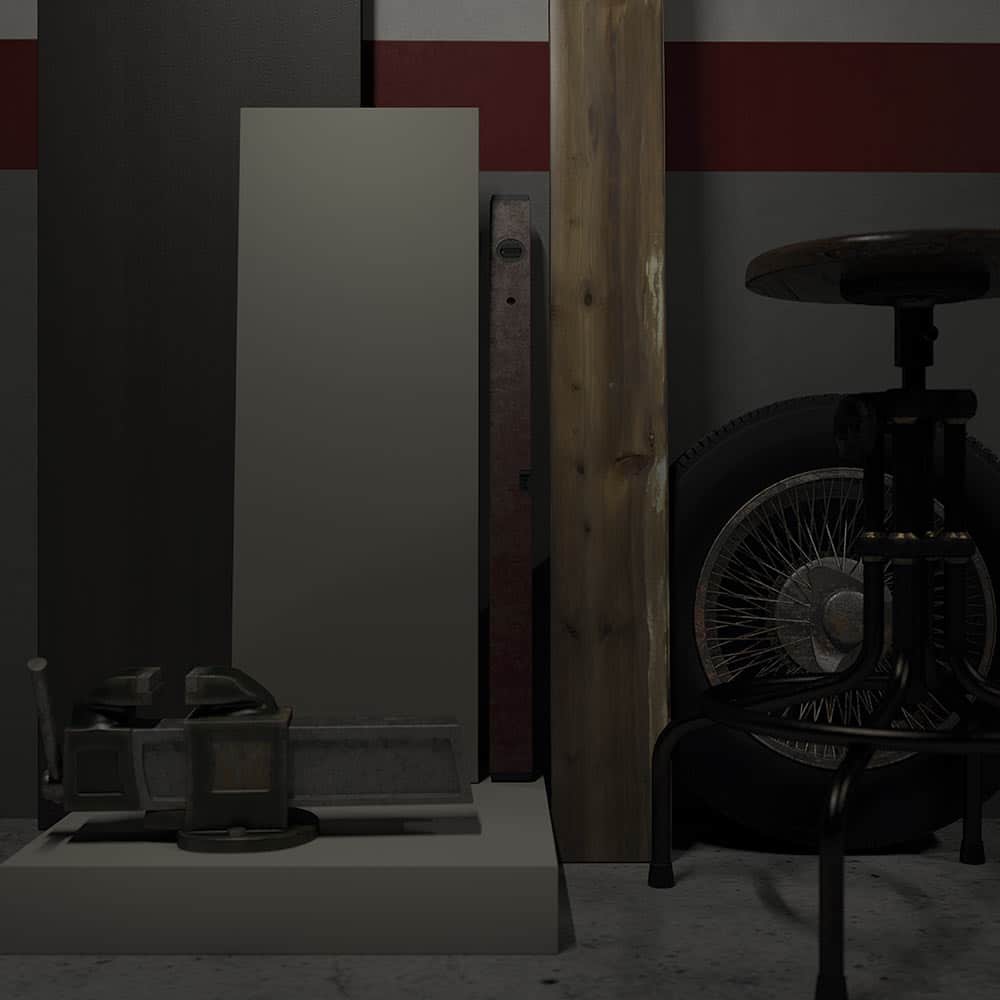 Vista detallada de un rincón de la cocina rebeldía ambientada en un garaje en el que se aprecia la rueda de una motocicleta